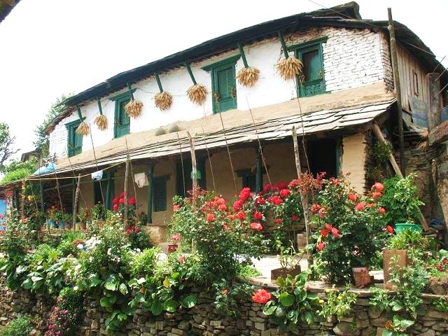 Hus längs med vandringsleden i Annapurna
